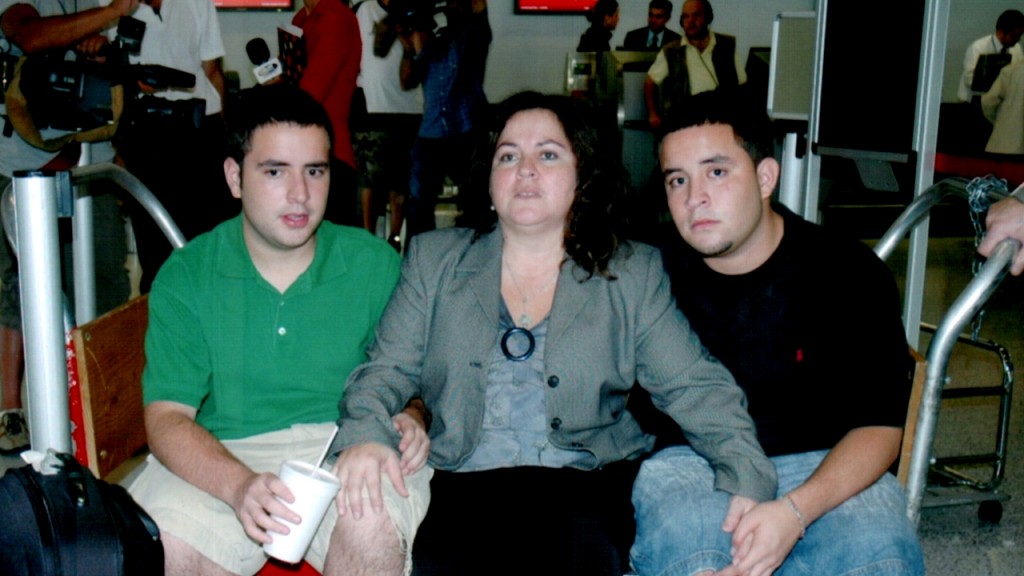 Juan, Alex and their mum Liliana at the Miami Airport minutes before she was deported to Colombia.